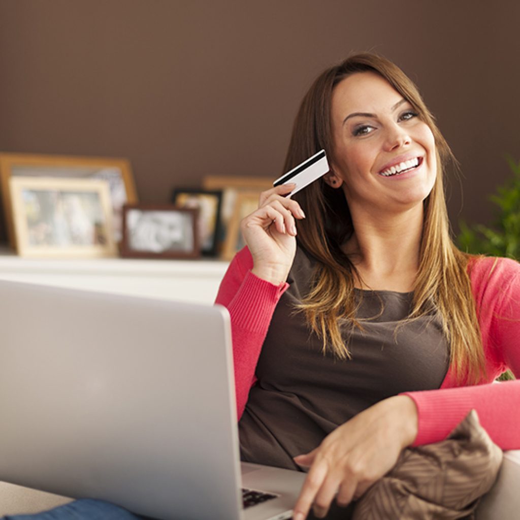 Beautiful woman loving online shopping