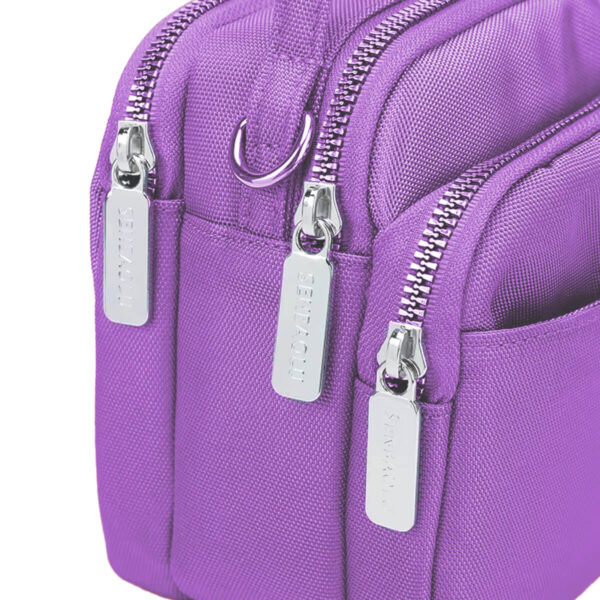 15319153637-mini-bolsa-transversal-pequena-compacta-roxo-4.jpg