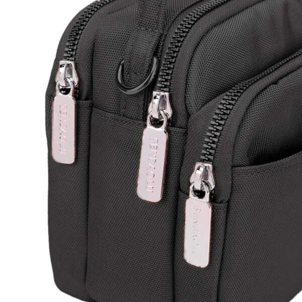 15319158163-mini-bolsa-transversal-pequena-compacta-preto-4.jpg